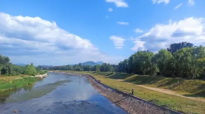 a view of a river from a bridge at Community Park Apartment in Niš