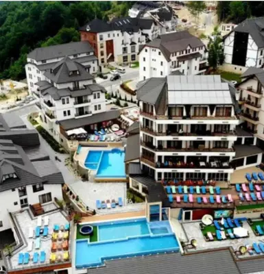 an aerial view of a resort with a swimming pool at Exclusive Apartment B7 Milmari Resort in Kopaonik