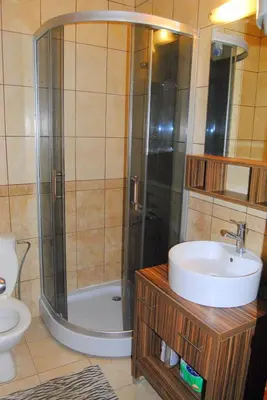 a bathroom with a shower and a sink at Relax Apartment in Vrnjačka Banja