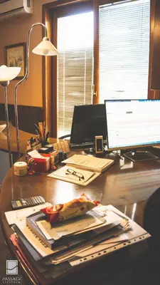 a desk with a computer and a monitor on it at Apartments Passage in Vrnjačka Banja
