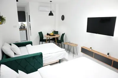 a living room with a couch and a tv at 