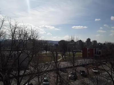 a view of a city with buildings and trees at Prenoćište Konstantin 2008 in Niš