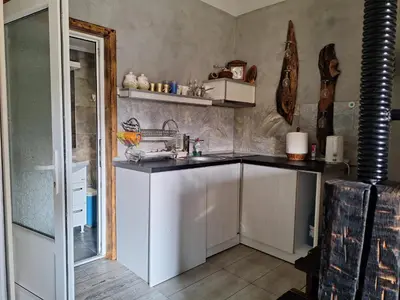 a kitchen with a sink and a counter top at Apartment Mia in Vrnjačka Banja