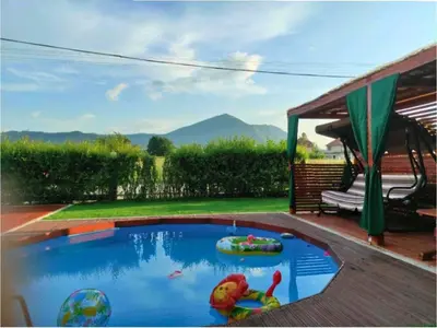a small swimming pool in a backyard at Villa Saturea in Boljevac