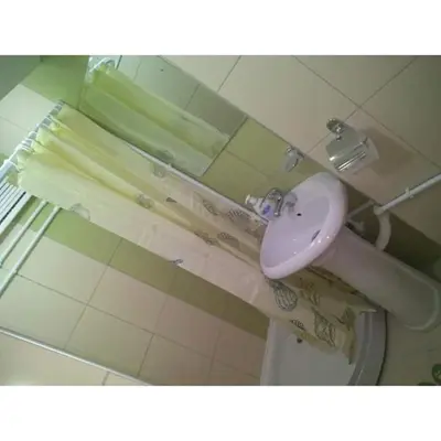 a bathroom with a sink and a toilet at Apartmani Milosavljevic in Soko Banja