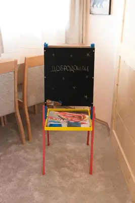 a brightly colored table with a sign on it at Boni M in Kopaonik
