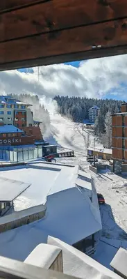 a view of a snow covered mountain from a building at Angella KOP Konaci in Kopaonik