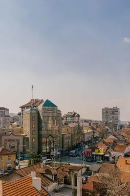 a view of a city with buildings and roofs at NAR Royalton Accommodation in Niš