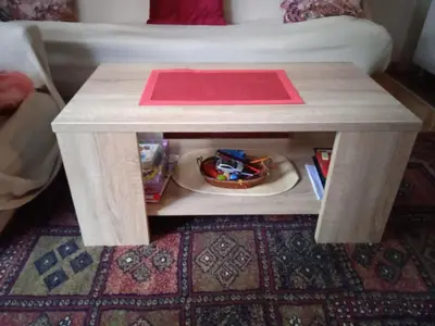 a table with a plate of food on top of it at Apartman NADA in Vrnjačka Banja