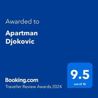 a blue phone screen with the text awarded to an apartment dinosaur at Apartman NADA in Vrnjačka Banja