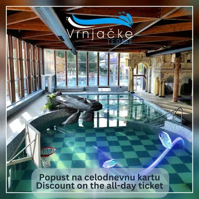 a pool in a hotel with a sign that reads project me ecological karuna at Hotel Danica in Vrnjačka Banja