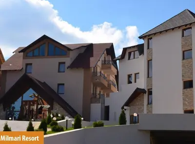 a row of buildings in front of a building at Lux apartment Milmari Reko E4 Kopaonik in Kopaonik