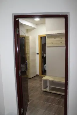 a mirror in a room with a bathroom at Lux apartment Milmari Reko E4 Kopaonik in Kopaonik