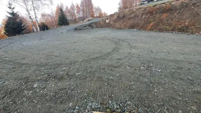 a dirt road on the side of a hill at Apartments Topview Kopaonik-Dvori in Kopaonik