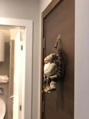 a bunch of stuffed animals hanging on a door at Milmari Resort Premier 47 in Kopaonik