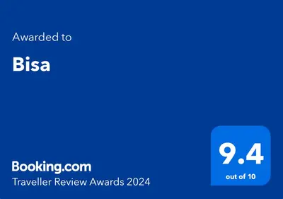 a blue screen with the text awarded to bisa traveler review awards at Bisa in Soko Banja