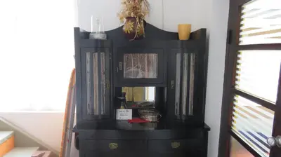 a black book shelf in a room at Guest House Pavlovic in Soko Banja