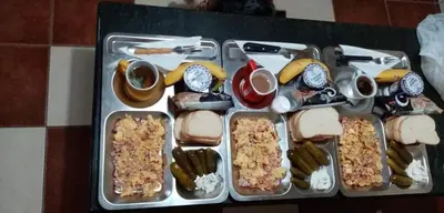 a tray of food with different types of food at Etno selo Vile Jefimija, selo Preobrazenje, Vranje in Vranje