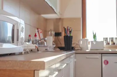 a kitchen with a sink and a counter top at Snow Oasis Kopaonik in Kopaonik