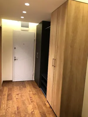 an empty room with a closet and a door at Apartment East in Kopaonik
