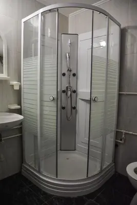 a shower with a glass door in a bathroom at Allegro dream in Vranje