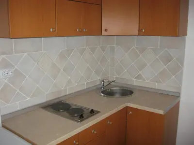 a kitchen with a sink and a counter top at Villa Sofija in Kopaonik