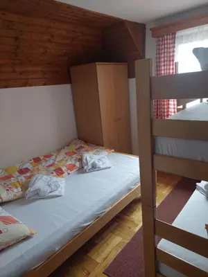 a bedroom with a bunk bed and a bunk bed gmaxwell gmaxwell gmaxwell gmaxwell gmaxwell gmaxwell at Villa Sofija in Kopaonik