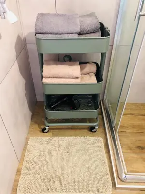 a towel rack with towels on it in a bathroom at View - Apartment at Kopaonik in Kopaonik