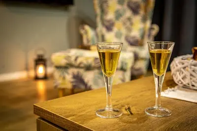 two glasses of champagne sitting on a table at View - Apartment at Kopaonik in Kopaonik