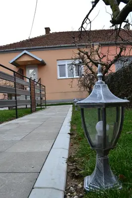 a street light in front of a house at Smestaj Pandora Sobe sa kupatilom in Jagodina