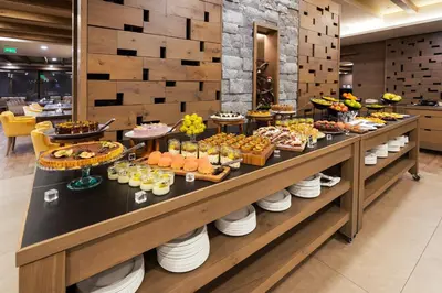 a buffet line with many different types of food at Gorski Hotel & Spa in Kopaonik