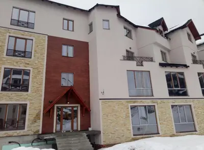 an example of a house in the snow at Apartman Šilja L22 Milmari Kopaonik in Kopaonik