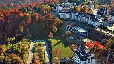an aerial view of a large building in a city at PROMO Evergreen apartments in Kopaonik