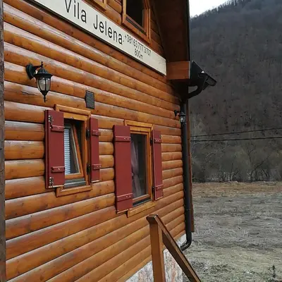 a building with windows on the side of it at Vila Jelena in Crni Vrh