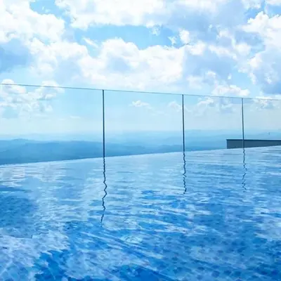 a swimming pool with a view of the sky at Privat Studio Milmari in Kopaonik