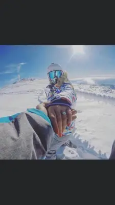 a person sitting on top of a snow covered mountain at Privat Studio Milmari in Kopaonik