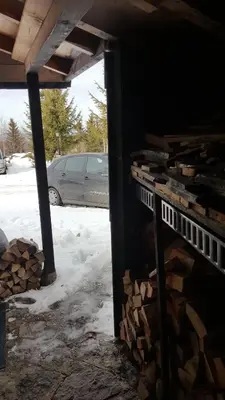 a room with a pile of wood in a building at GreenPointMountainHouse for 6 persons in Kopaonik