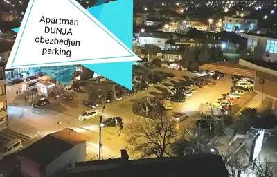 an aerial view of a parking lot at night at Apartman DUNJA sa terasom in Vranje