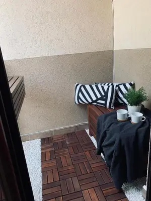 a room with a table with two cups on it at Apartment Take a breath in Vrnjačka Banja