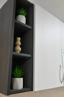 a cabinet with pots and plants in it at Apartment Marijana in Vrnjačka Banja