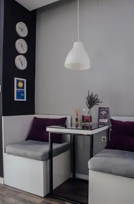 a dining room with a table and a chair and a table at Vladana LUX App in Kruševac
