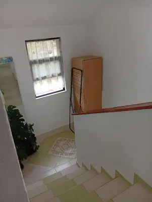 an empty room with a counter and a window at Apartman Kaća in Vrnjačka Banja