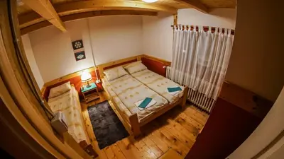 an overhead view of a bedroom with a bed at Golema Reka in Crni Vrh