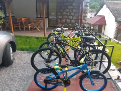 a row of bikes parked next to each other at Sobe Gmitrovic in Rtanj
