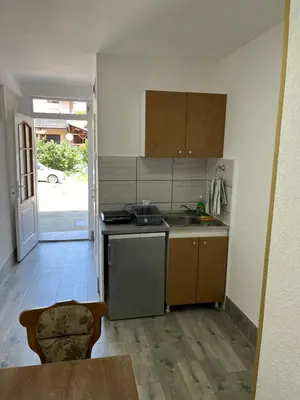 a kitchen with a sink and a stove at Vojin i Lena in Soko Banja