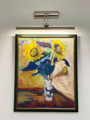 a painting of flowers in a vase on a wall at Lux Apartman 'Opereta' A-19 in Vrnjačka Banja