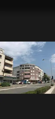 a view of a street with two buildings and a road at La Apartamento in Jagodina