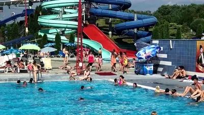 a group of people in the water at a water park at Tanja apartman in Jagodina