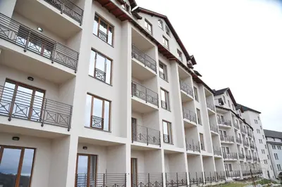 an exterior view of an apartment building with balconies at Milmari boutique S3 lux in Kopaonik