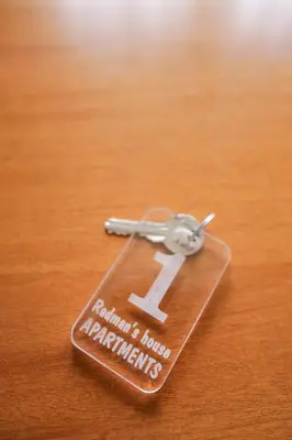 a metal key tag with the number seven on it at Radman's house in Niš